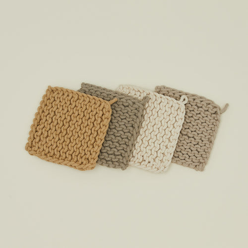 Crocheted pot holders in natural colors