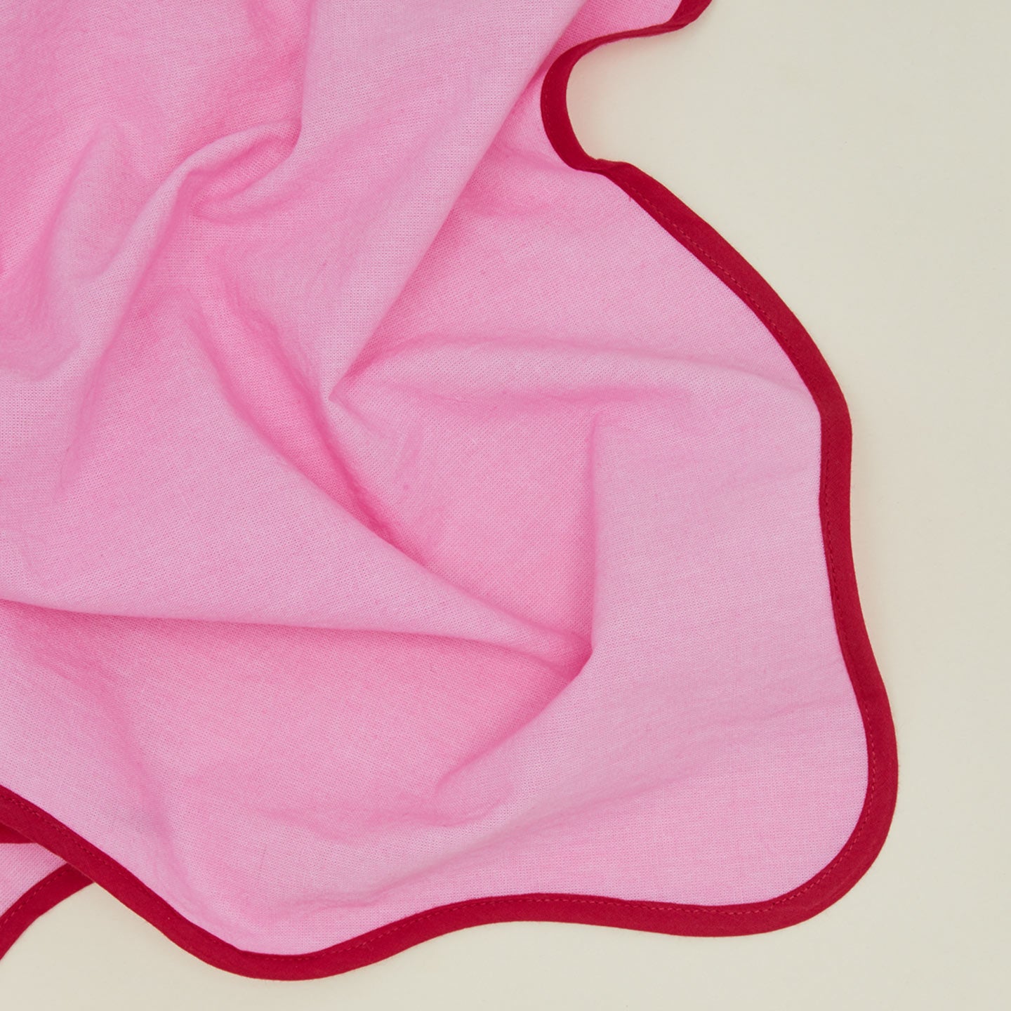 Detailed view of shrimp scalloped napkin